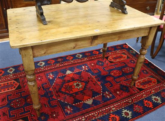 A pine kitchen table, with one drawer, W.122cm